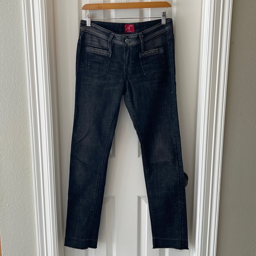 Levi’s skinny straight leg, dark gray jeans, raw hem and like new condition